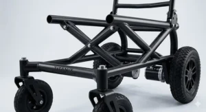 Illustration of a reinforced steel frame for a heavy duty outdoor electric wheelchair, showcasing thick-gauge tubing and precision welds.