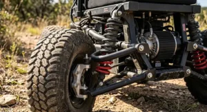 Close up view of the durable suspension system on an all terrain power wheelchair.